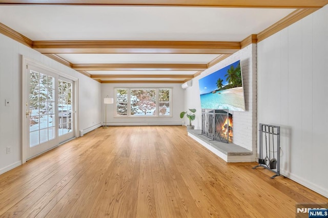 unfurnished living room with beamed ceiling, ornamental molding, a baseboard radiator, light hardwood / wood-style floors, and a brick fireplace