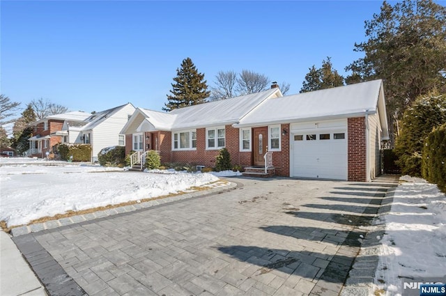 single story home with a garage