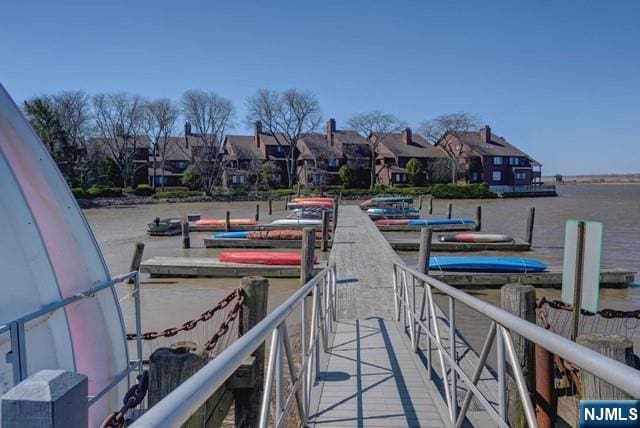 view of dock with a water view