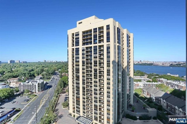 view of property with a water view