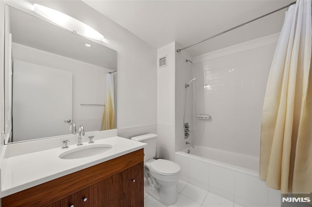 full bath with vanity, shower / bathtub combination with curtain, visible vents, tile patterned flooring, and toilet