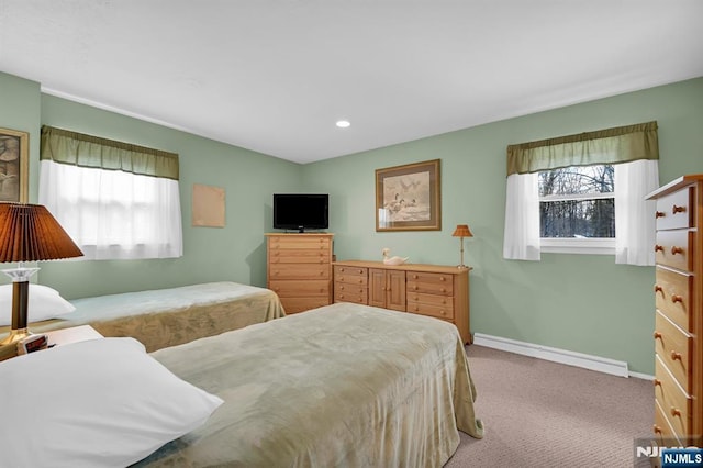 bedroom featuring light carpet, multiple windows, baseboards, and recessed lighting