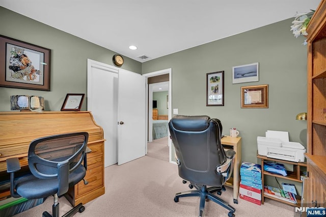 office featuring light carpet and visible vents