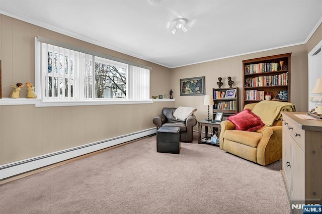 living area featuring a baseboard radiator, light colored carpet, and crown molding