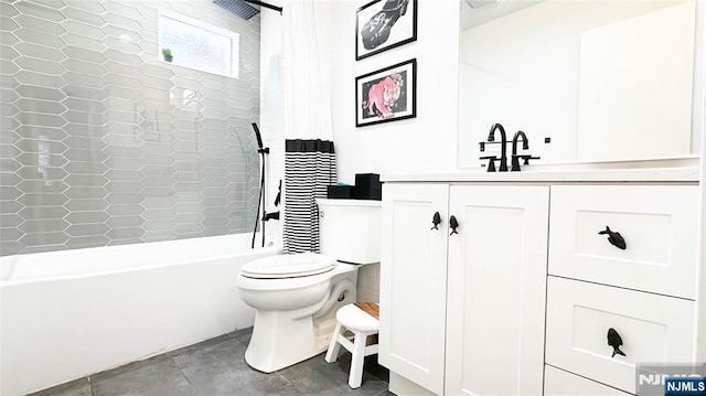 full bathroom with vanity, toilet, and shower / bath combo