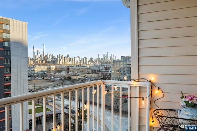 balcony featuring a city view