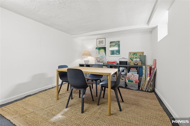 home office with a textured ceiling