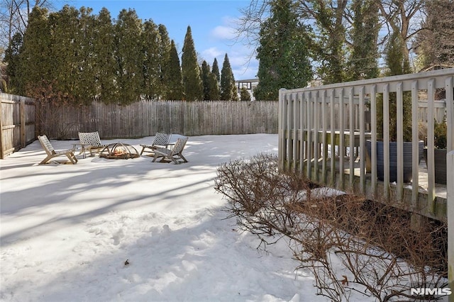 view of yard layered in snow