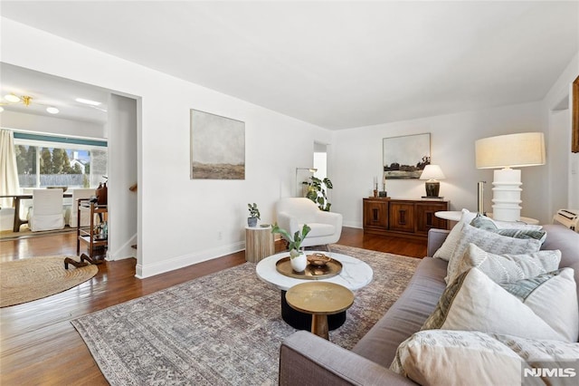 living room featuring dark hardwood / wood-style floors