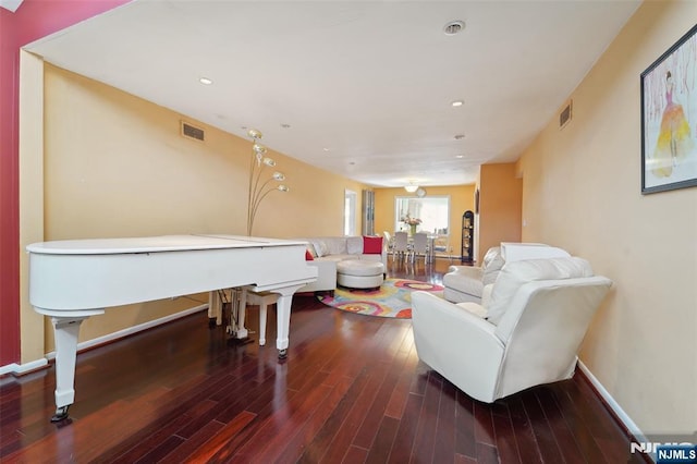 living room with dark wood-type flooring