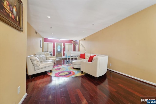 living room featuring dark hardwood / wood-style floors