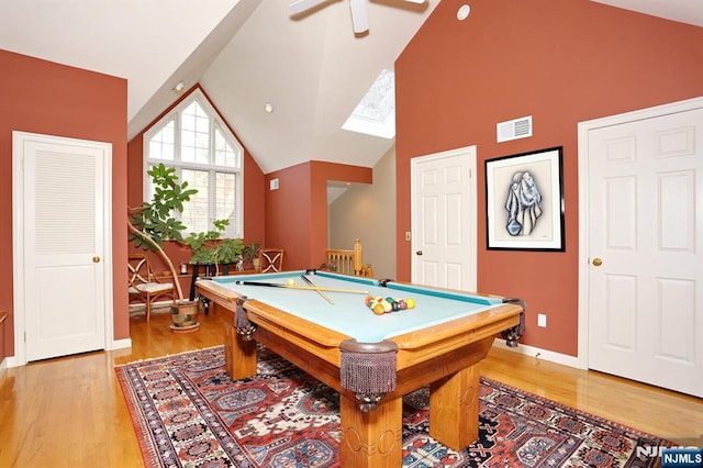 playroom with high vaulted ceiling, pool table, and light hardwood / wood-style floors