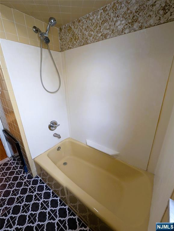 bathroom featuring tub / shower combination