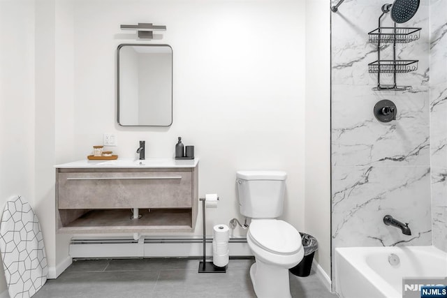 full bathroom with vanity, toilet, tiled shower / bath, and baseboard heating