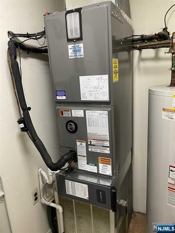 utilities featuring gas water heater and heating unit