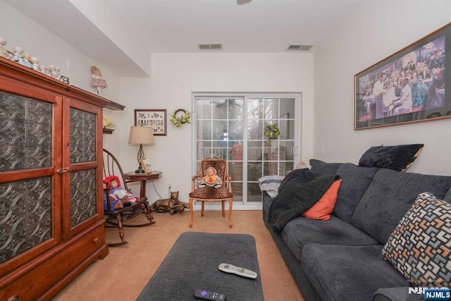 living room featuring light colored carpet