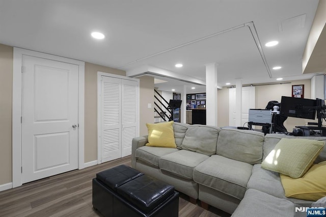 living room featuring dark hardwood / wood-style flooring