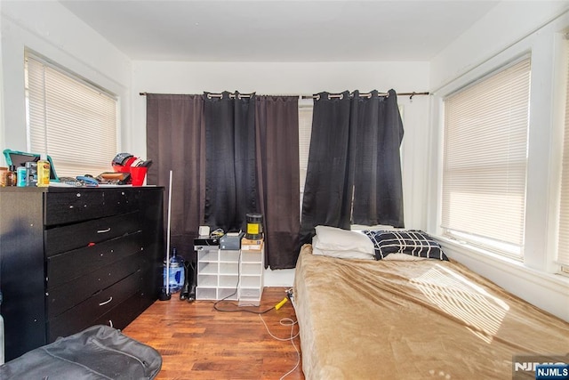 bedroom featuring hardwood / wood-style flooring