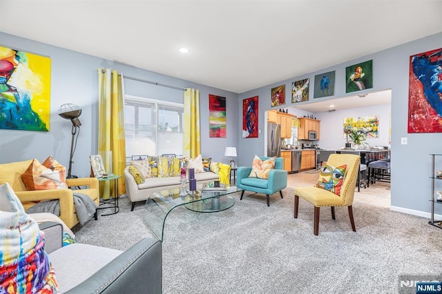 living room featuring light colored carpet