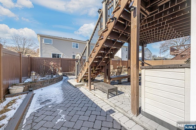 view of snow covered patio