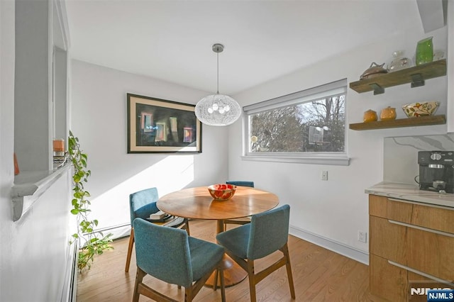 dining room featuring light wood-style floors