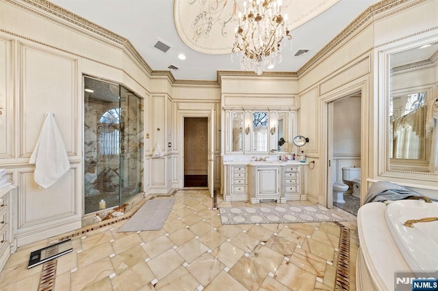 full bathroom featuring an inviting chandelier, vanity, plus walk in shower, crown molding, and toilet