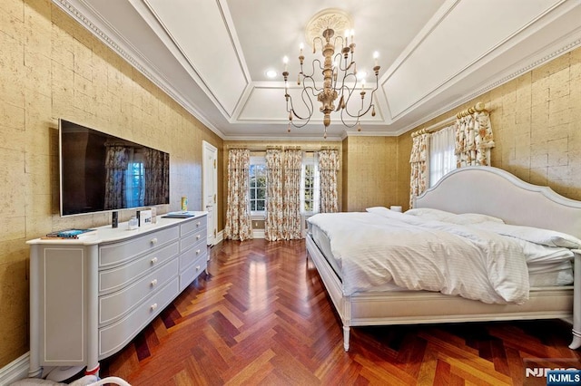 bedroom with a raised ceiling, parquet flooring, crown molding, and an inviting chandelier