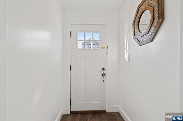 doorway featuring dark hardwood / wood-style flooring