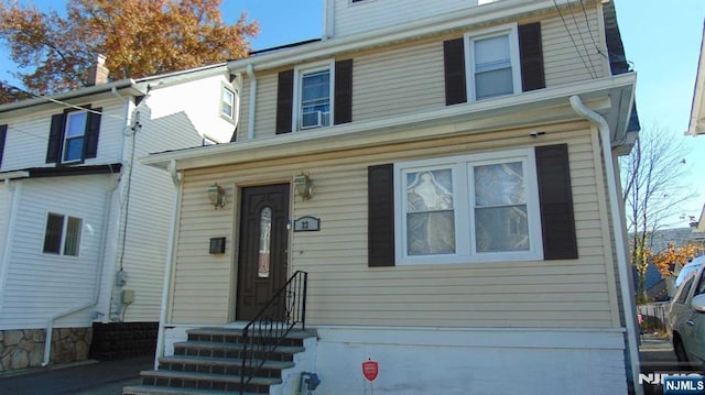 view of front of home with entry steps