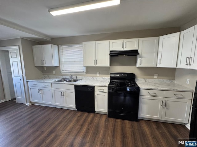 kitchen featuring sink, light stone counters, dark hardwood / wood-style flooring, black appliances, and white cabinets