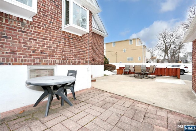 view of patio with outdoor dining area