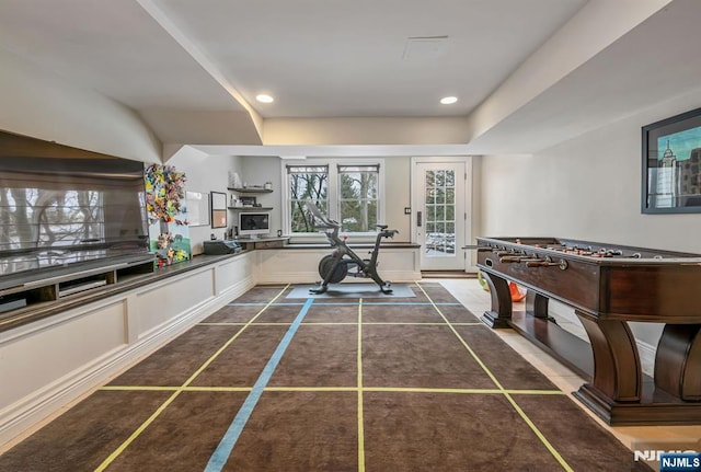 interior space featuring tile patterned floors, baseboards, and recessed lighting