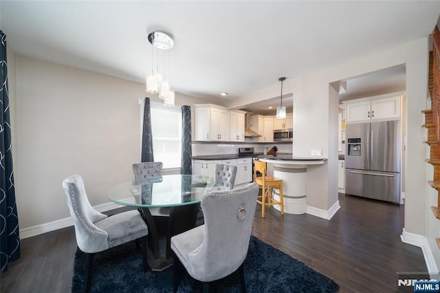 dining room featuring dark hardwood / wood-style floors