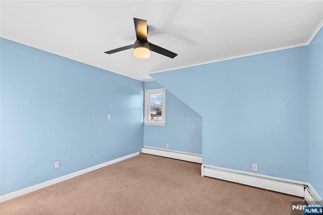 additional living space featuring ceiling fan, carpet, and a baseboard radiator