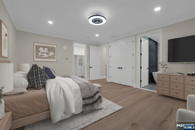 bedroom featuring light hardwood / wood-style flooring