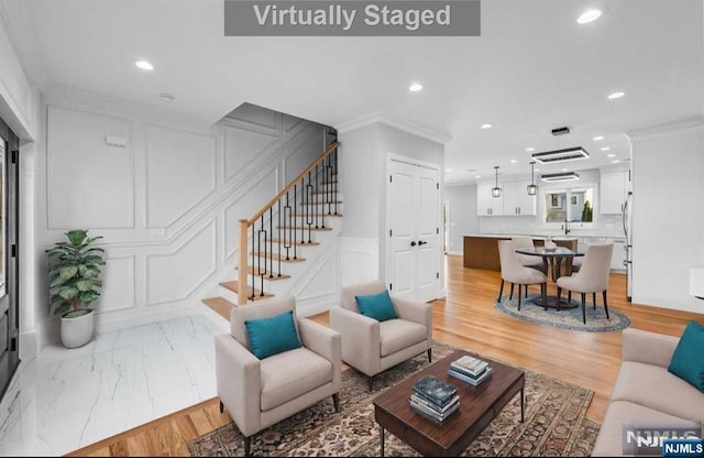 living room featuring ornamental molding