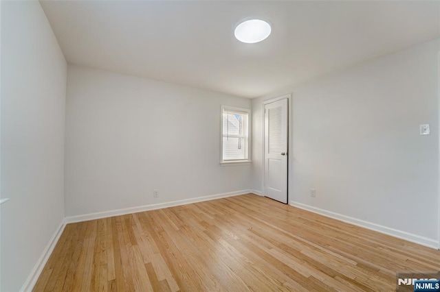 empty room featuring hardwood / wood-style floors