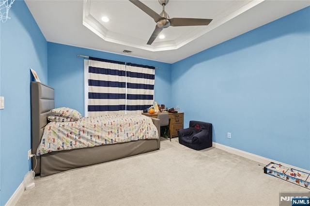 bedroom featuring baseboards, visible vents, a raised ceiling, carpet flooring, and recessed lighting