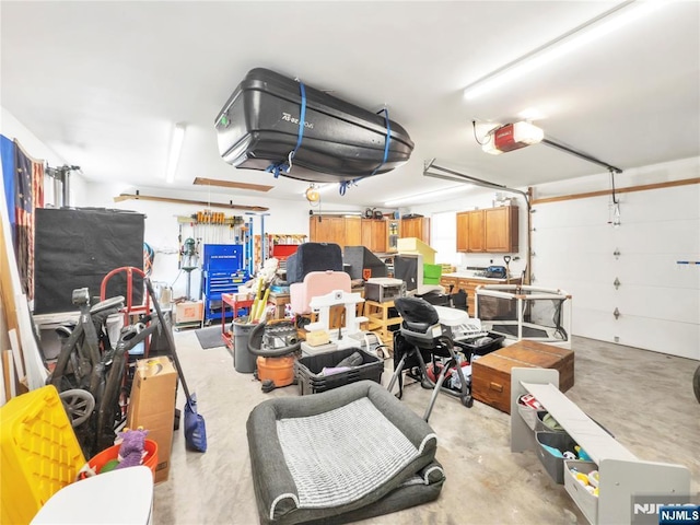 garage featuring a garage door opener