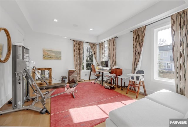 interior space with recessed lighting, a wealth of natural light, and light wood-style flooring