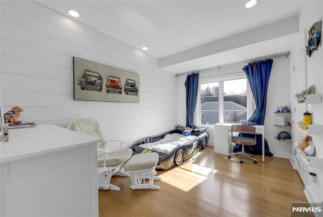 bedroom with light wood-type flooring and recessed lighting