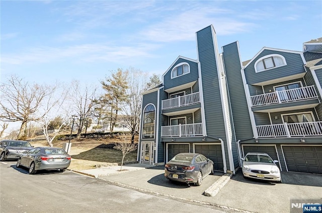 view of property featuring driveway