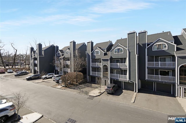 view of building exterior with a residential view