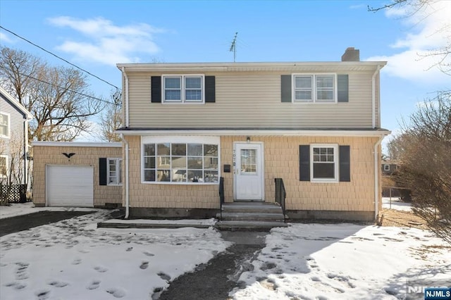 view of property featuring a garage