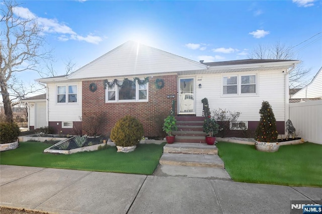 view of front of home with a front lawn