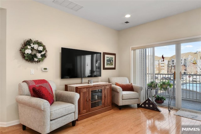 living area with light wood-type flooring