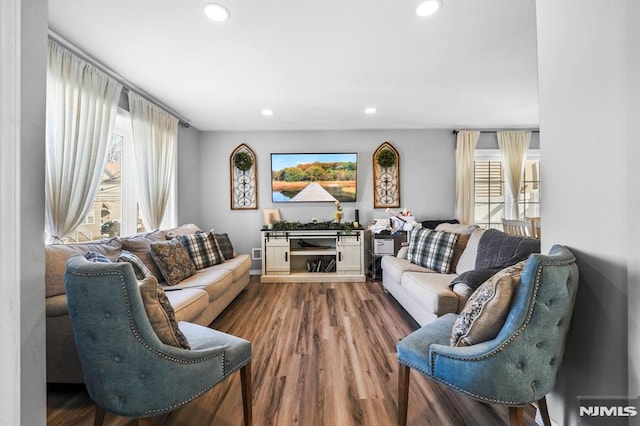 living room featuring wood finished floors and recessed lighting