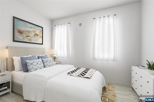 bedroom featuring light wood-type flooring