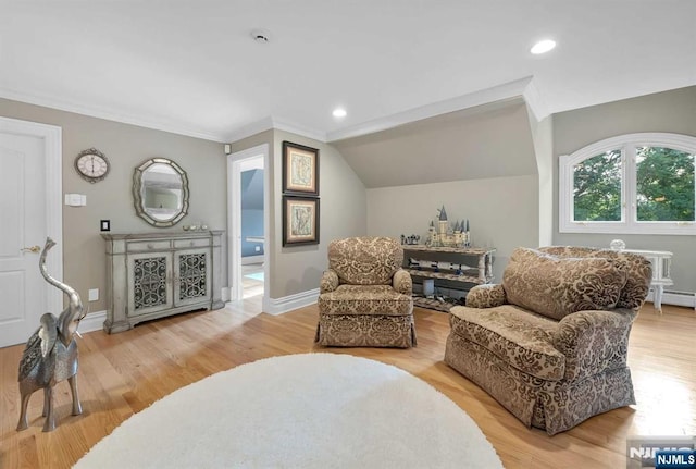 living area with light wood-style floors, recessed lighting, baseboards, and ornamental molding