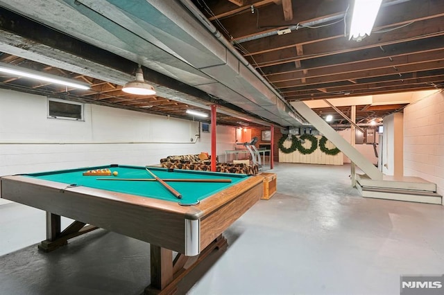 recreation room featuring concrete floors